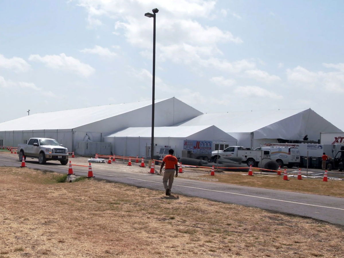 <i>US Department of Health and Human Services/Reuters/File via CNN Newsource</i><br/>Covered structures are seen at the US Department of Health and Human Services' unaccompanied minors migrant detention facility at Carrizo Springs