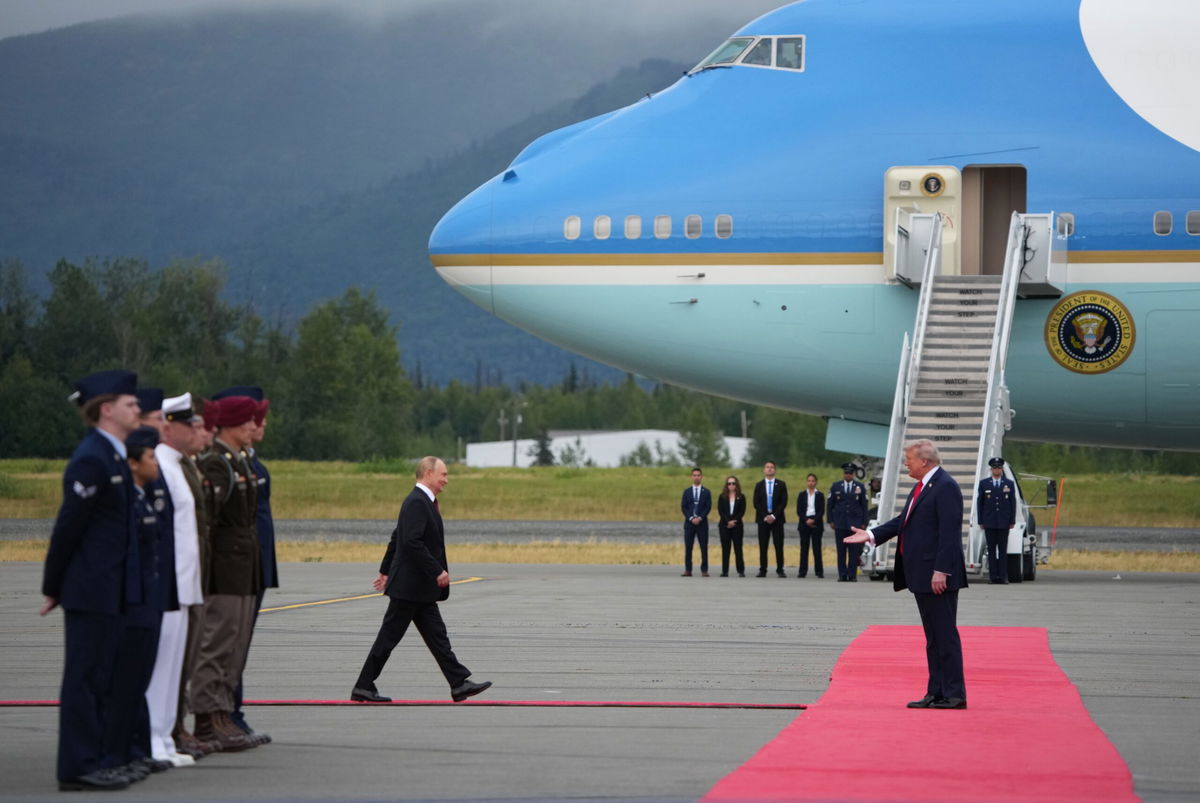 <i>Andrew Harnik/Getty Images via CNN Newsource</i><br/>President Donald Trump greets Russian President Vladimir Putin as he arrives at Joint Base Elmendorf-Richardson on August 15 in Anchorage