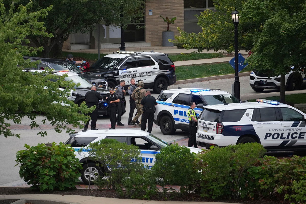 <i>Matt Slocum/AP via CNN Newsource</i><br/>Police gather at Villanova University after an active shooter was reported August 21