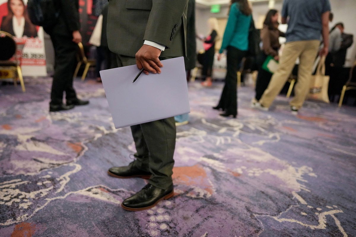 <i>Eric Thayer/Bloomberg/Getty Images via CNN Newsource</i><br/>Job seekers attend a Diversity Career Group job fair in Los Angeles on April 17.