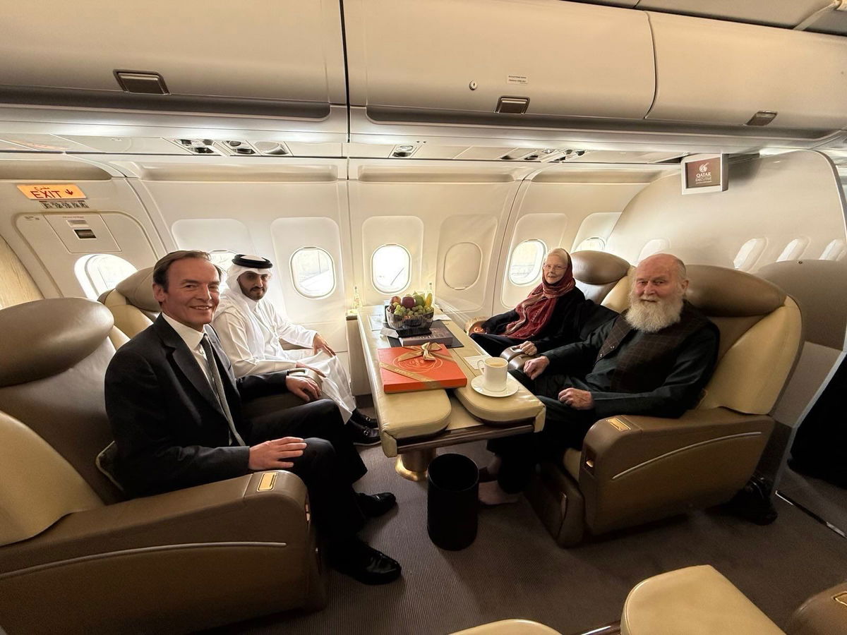 <i>Qatari Ministry of Foreign Affairs via CNN Newsource</i><br/>Qatari and British diplomats are pictured with Barbie and Peter Reynolds as they prepare to depart Kabul to Doha on September 19.