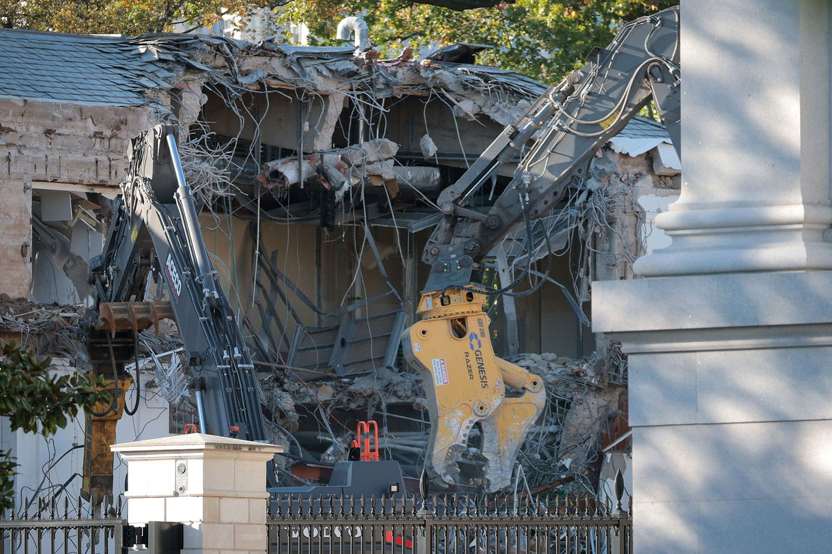 <i>Kevin Dietsch/Getty Images via CNN Newsource</i><br/>Workers demolish the facade of the East Wing of the White House on Monday