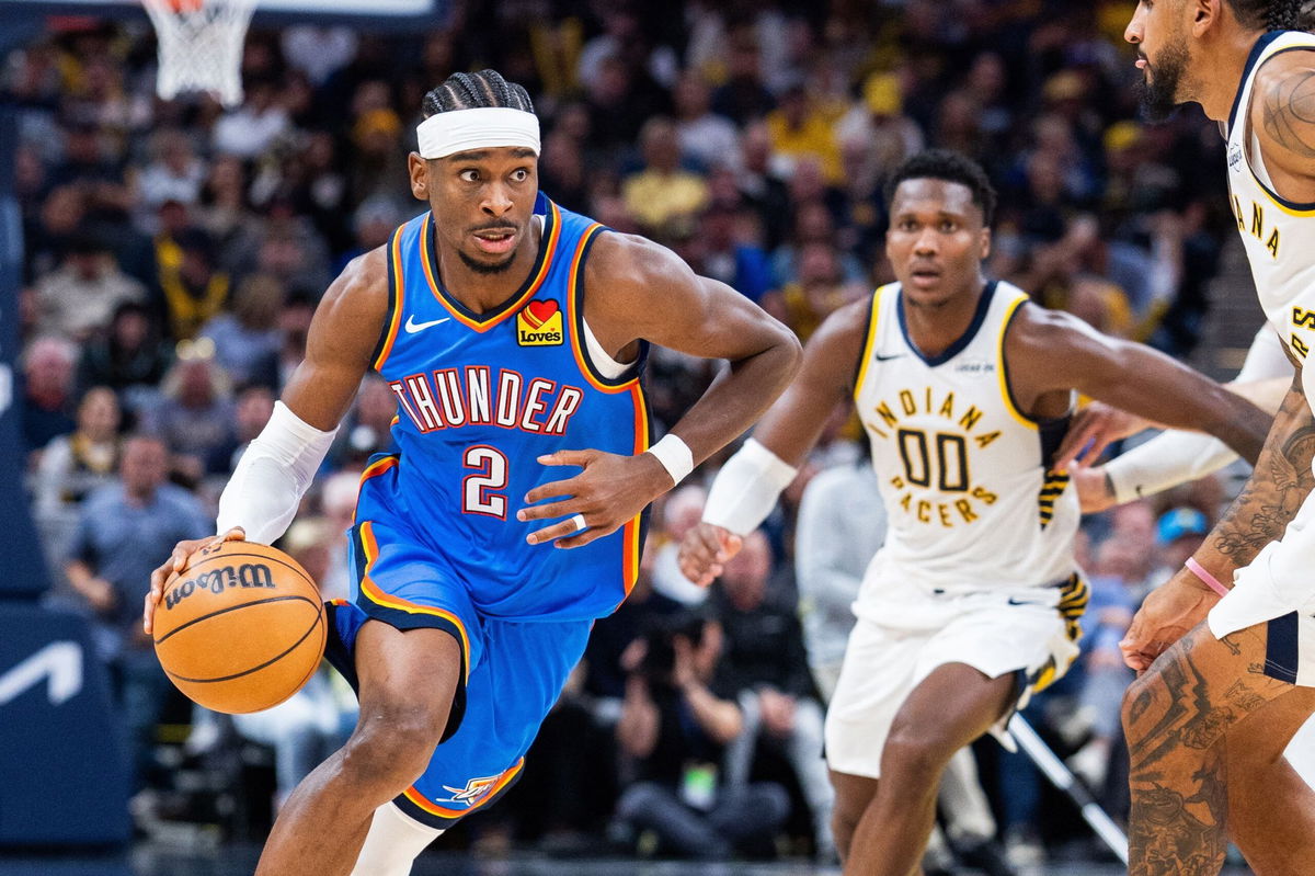 <i>Trevor Ruszkowski/Imagn Images/Reuters via CNN Newsource</i><br/>Oklahoma City Thunder guard Shai Gilgeous-Alexander dribbles the ball while Indiana Pacers guard Bennedict Mathurin chases him.