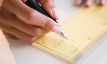 The Federal Reserve says it is considering "winding down" its processing of paper checks for banks and their customers.