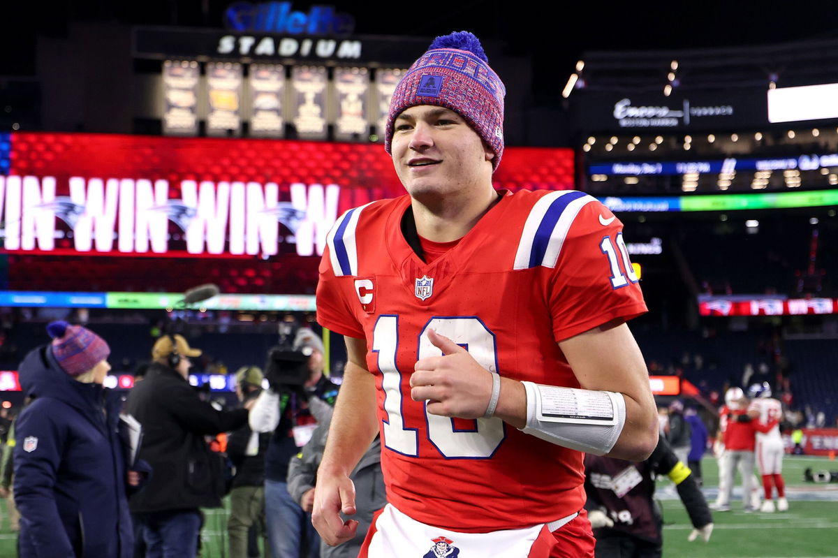 Drake Maye runs off the field after the win over the Giants at Gillette Stadium.