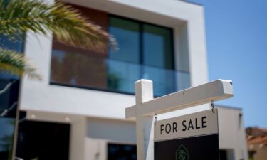 A "For Sale" sign in front of a home in the Encino neighborhood of Los Angeles
