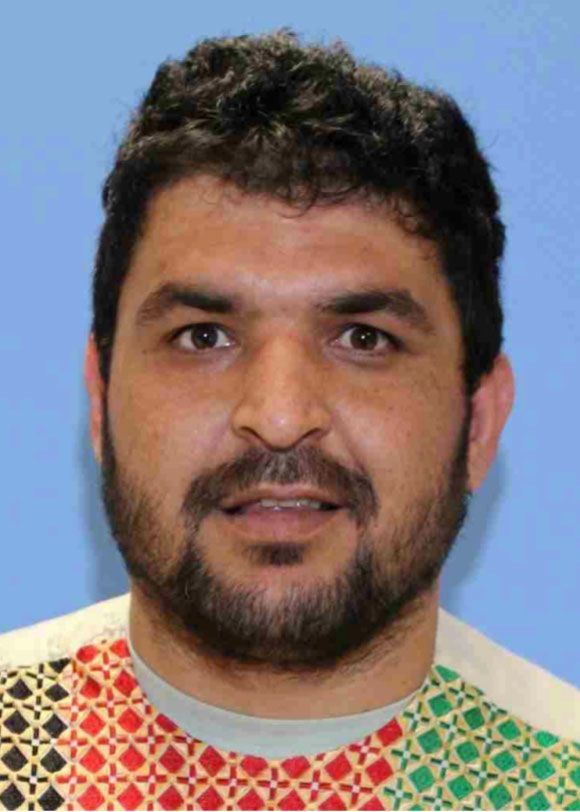 Accused National Guard shooter pleaded not guilty to charges at first court appearance from the hospital