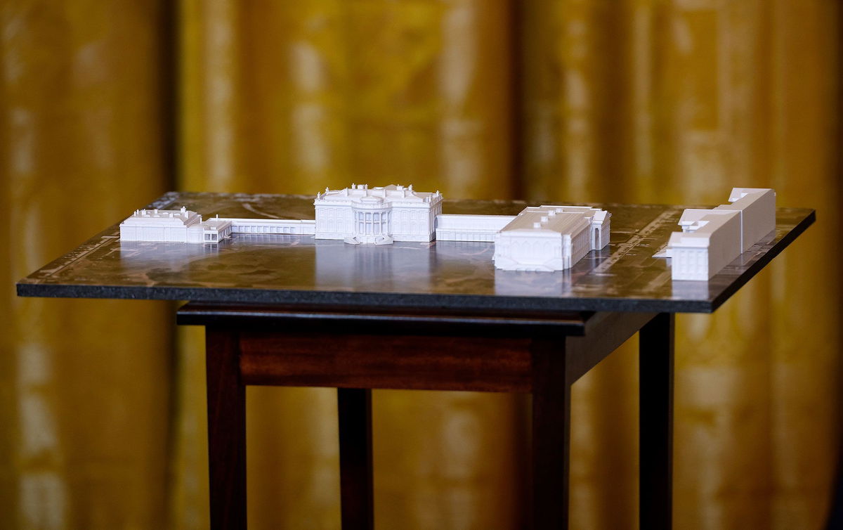 A model of the White House and proposed ballroom is displayed during a fundraising dinner with President Donald Trump in the East Room of the White House on October 15.